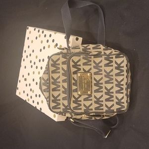 Small Michael Kors crossbody bag, tan and black. In great condition